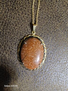 Gold-Tone Pendant Necklace with Sparkling Brown Stone